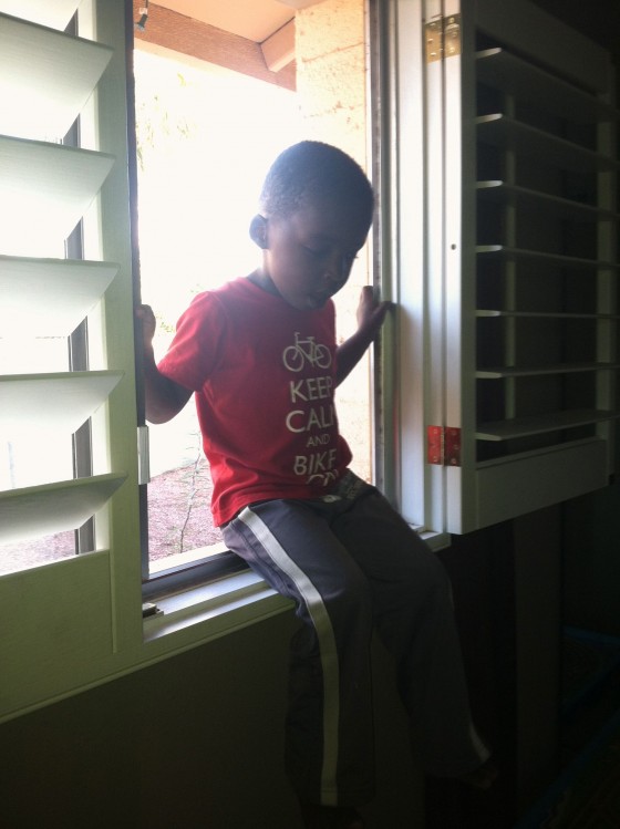 Mommy Ezra's stuck in the window