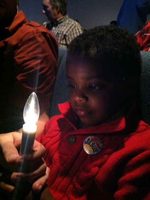 Noah at candlelight service.